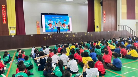 Teachers and students at a ScamAlert Junior talk